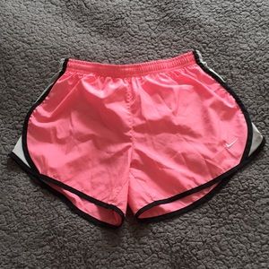 Pink Nike Dri-Fit running shorts